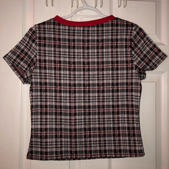Short sleeve plaid top with red accents. - Picture 2 of 3